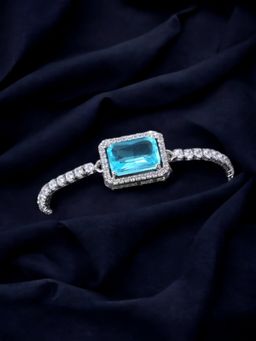 Jewels Galaxy - Silver Plated Rectangular Turquoise Crystal Studded Matrix Tennis Bracelet