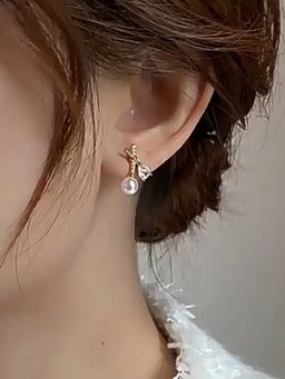 Jewels Galaxy - Gold Plated American Diamond Studded Cross Shape Korean Stud Earrings