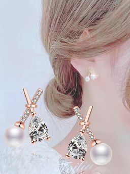 Jewels Galaxy - Rose Gold Plated American Diamond Studded Cross Shape Korean Stud Earrings