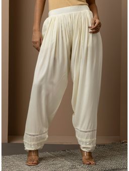 Lakshita - Solid Off White Pleated Salwar with Hem Lace Work
