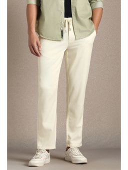 Louis Philippe - Men Beige Solid Flat Front Casual Trousers