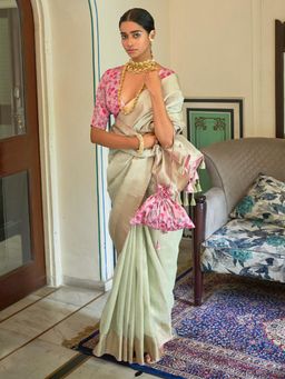Akhilam - Womens Tissue Light Green Woven Designer Saree with Unstitched Blouse