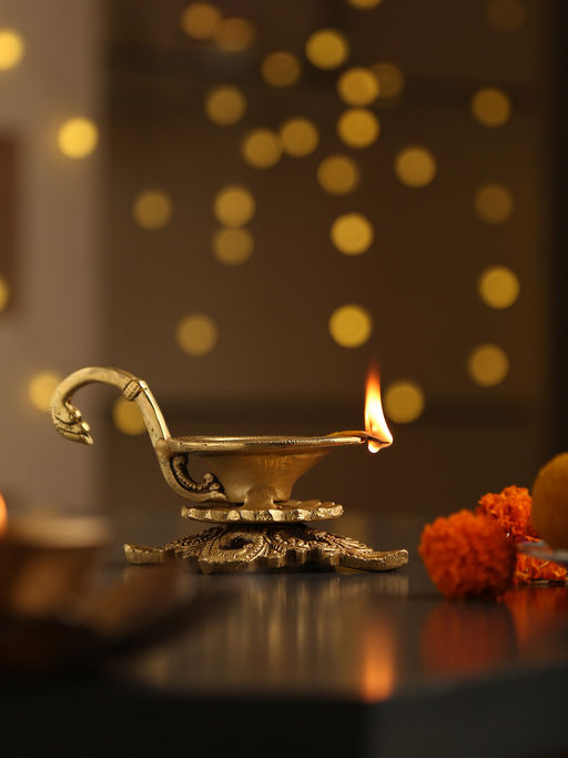 Revive Home Brass Diya with Handle & Intricate Base