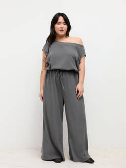 Cider - Asymmetrical Neck Drawstring Jumpsuit Curve & Plus
