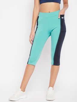 Clovia - Snug Fit High-Rise Active Capri In Light Blue With Side Panels