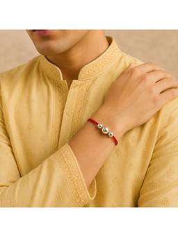 SAMIKA - Unisex Red Statement Silver Rakhi and Roli with Chawal