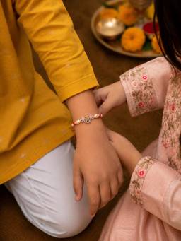 SAMIKA - Unisex Multi-Color Traditional Rakhi Silver Rakhi and Roli with Chawal