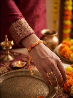 SAMIKA - Unisex Yellow Traditional Rakhi Silver Rakhi and Roli with Chawal