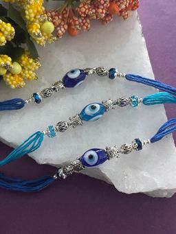 Digital Dress Room - Designer Rakhi Navy Blue & Sky Blue Evil EyeTortoise Thread Rakhi (Pack of 3)