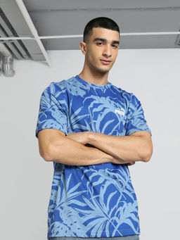 Puma - Essentials+ PALM RESORT AOP Mens Blue T-Shirt