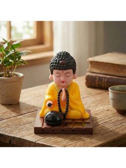 eCraftIndia - Yellow Moving Head Monk Buddha Idol Showpiece