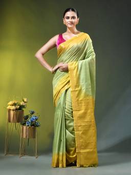 CHARUKRITI - Pistachio Green and Yellow Silk Zari Border Saree