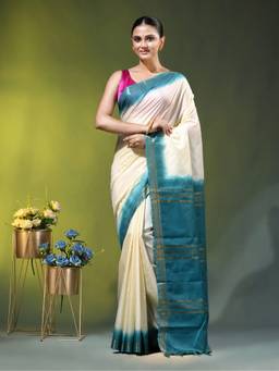 CHARUKRITI - Cream and Teal Blue Silk Zari Border Saree