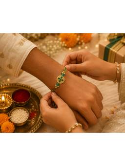 REENISAA - Emerald Kundan Twin Motif Rakhi with Green Thread and Pearl Accents