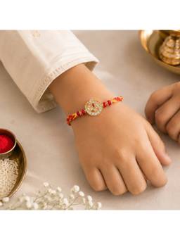REENISAA - Red Radiance Handmade Rakhi with Crystal Floral Medallion