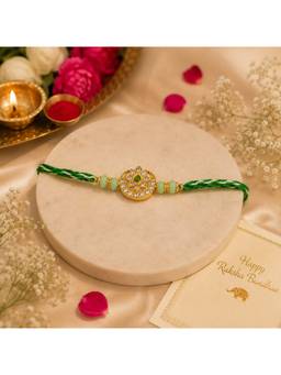 REENISAA - Emerald Radiance Handmade Rakhi with Crystal Floral Medallion