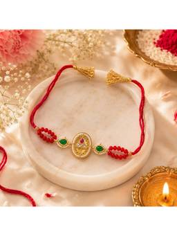REENISAA - Royal Heritage Kundan Rakhi with Emerald Accents and Coral Beads