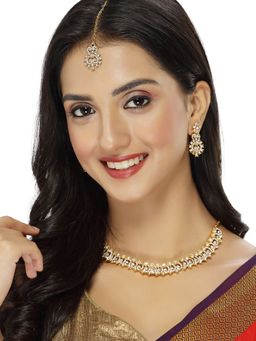 Sukkhi - Festive Gold Plated AD White Stone Collar Bone Necklace with Earring & Maangtika