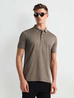 Arrow - Green Solid Pique Polo T-Shirt
