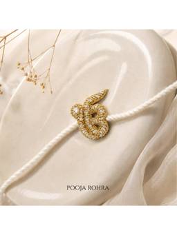 Label Pooja Rohra - Gold Ek Onkar Rakhi