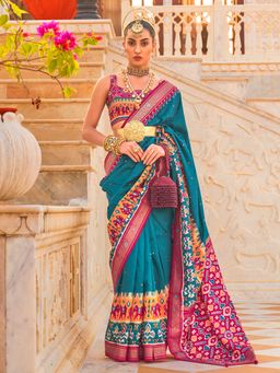 Akhilam - Women's Silk Blend Teal blue Embellished Designer Saree with Unstitched Blouse