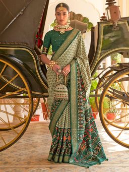 Akhilam - Women's Silk Blend Green Embellished Designer Saree with Unstitched Blouse