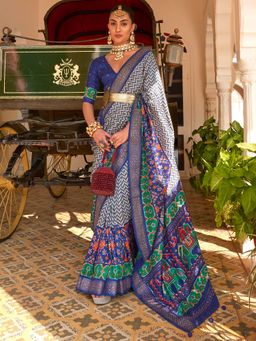 Akhilam - Women's Silk Blend Blue Embellished Designer Saree with Unstitched Blouse
