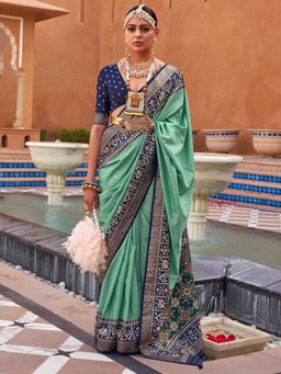 Akhilam - Women's Silk Blend Sea Green Woven Design Designer Saree with Unstitched Blouse