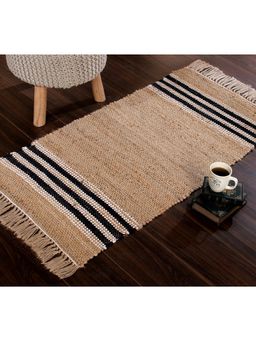 Sashaa World - Handwoven Jute Rug with Black and White Stripes and Tassels At The End.