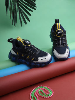 Truffle Collection - Blue Mesh Rotating Button Sneakers