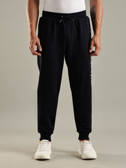 Tommy Hilfiger - Men Navy Blue Regular Fit Logo Mid Rise Joggers