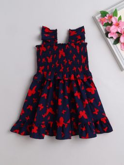The Magic Wand - Sleeveless Smoke Detail Butterfly Printed Frill Dress- Navy Blue