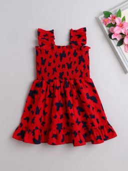 The Magic Wand - Sleeveless Smoke Detail Butterfly Printed Frill Dress- Red