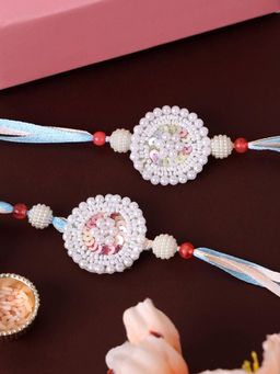 PANASH - Pearls Floral Shaped Thread Rakhis with Roli Chawal