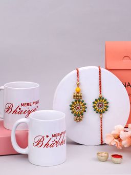 PANASH - Plated Floral Shaped Bhaiya Bhabhi Rakhis with Printed 2 Mug & Roli Chawal