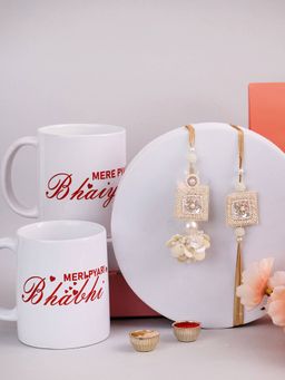 PANASH - Plated Floral Shaped Bhaiya Bhabhi Rakhis withwith Printed 2 Mug & Roli Chawal