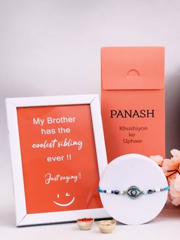 PANASH - Plated Evil Eye with Stone Studded Rakhi with Photo Frame, Roli Rice