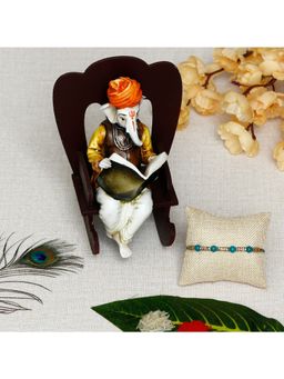 eCraftIndia - Pearls & Designer Rakhi with Lord Ganesha Idol & Roli Chawal Pack