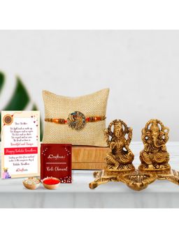 eCraftIndia - Designer Peacock Rakhi with Goddess Lakshmi, Lord Ganesha Idols with Decorative Diya