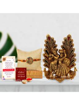 eCraftIndia - Beautiful Peacock Rakhi with Golden Radha Krishna Idol with Peacock Designer Diya