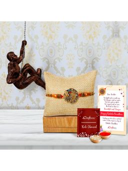 eCraftIndia - Designer Peacock Rakhi with Man Trying To Climb Wall Hanging Statue, Roli Chawal Pack