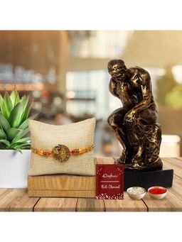 eCraftIndia - Designer Peacock Rakhi with Thinking Man Sitting On Rock Decorative Showpiece