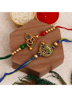 eCraftIndia - 2 Om Symbol & Peacock Designer Religious Rakhis with Roli Chawal Pack