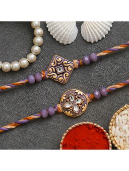 eCraftIndia - Purple & Golden 2 Precious Stone Designer Rakhis with Roli Chawal Pack