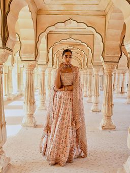 Karaj Jaipur - Fiza Peach Printed Pure Muslin Embroidered Lehenga With Blouse And Dupatta