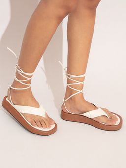 Twenty Dresses by Nykaa Fashion - White And Tan Lace Tie Up Flatforms