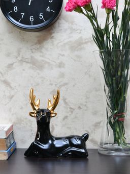 At Home by Nilkamal - Sitting Reindeer Showpiece Black & Gold