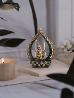 At Home by Nilkamal - Bal Krishna On Swing Polyresin Showpiece Gold