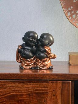 At Home by Nilkamal - Baby Monks Whispering Showpiece Gold