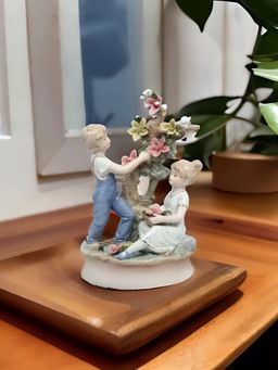 At Home by Nilkamal - Children Plucking Floral Showpiece Multi Color